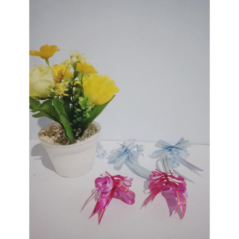

Pita-tarik | Pita-Kado | aksesoris-souvenir