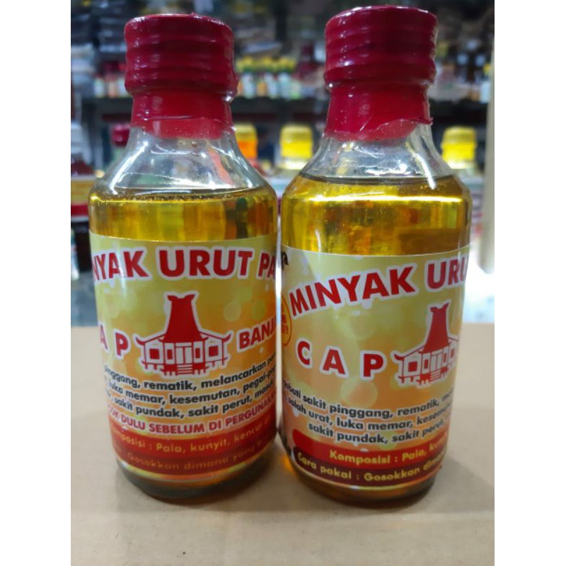 Minyak urut pala cap rumah adat banjar