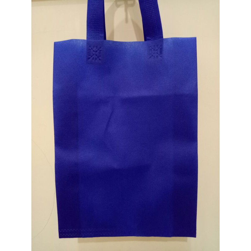 

Tas Spunbond Ukuran 25x35 Polos Per Lusin isi 12 pcs / Goodie bag tas Spunbond promosi