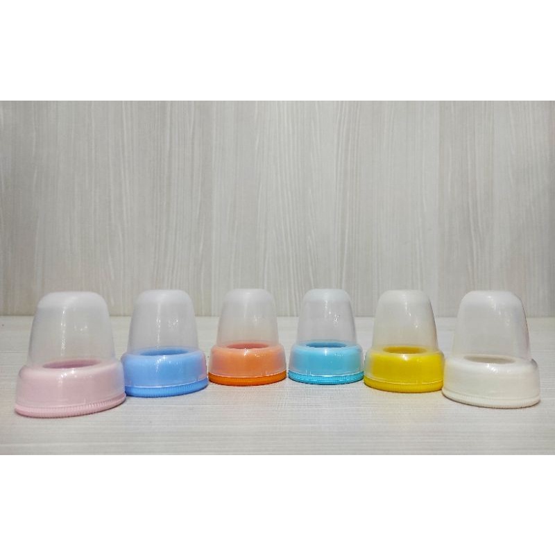 Tutup botol susu bayi