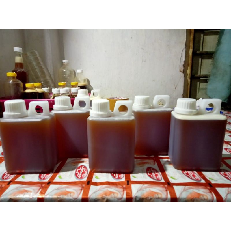 

madu liar asli volume 500ml/setengah liter lebih