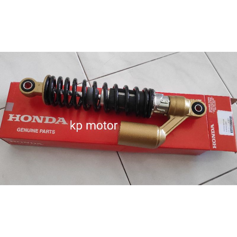 Shock belakang tiger revo ori