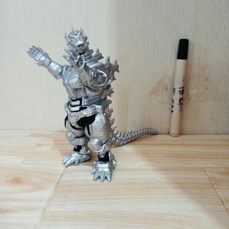 mainan figureGodzilla mecha silver
Mecha godzilla
Bahan vinyl