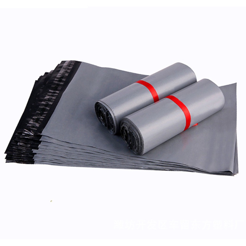 JAKARTAWHOLESALE [COD] ISI 100PCS PLASTIK POLYMAILER PLASTIC PACKING ONLINE GRAY 35x50Cm