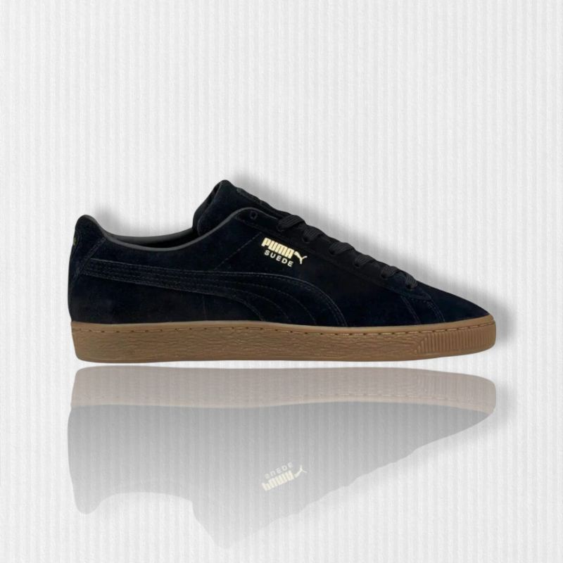 black suede pumas with brown sole
