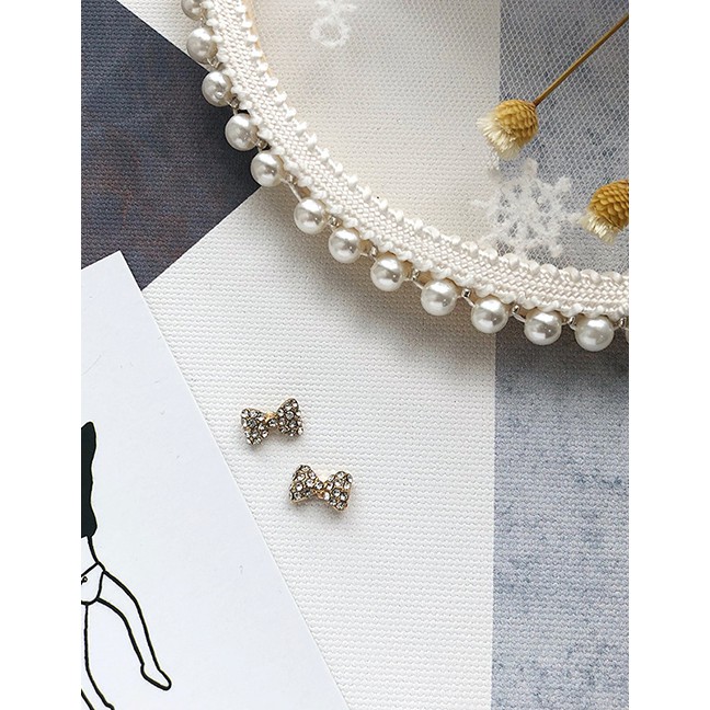 LRC Anting Tusuk Fashion Small Bow Pearl-studded Earrings D27869