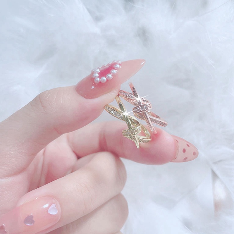 Cincin Model Terbuka Desain Silang Bahan Zirkon Warna Rose Gold Gaya Korea Untuk Wanita