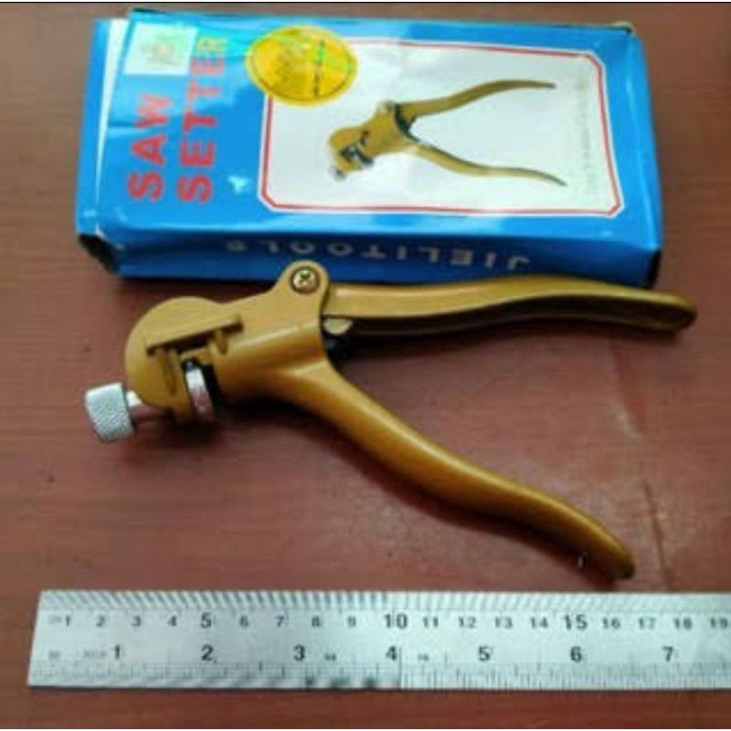 Pembelong gergaji otomatis SAw Setter