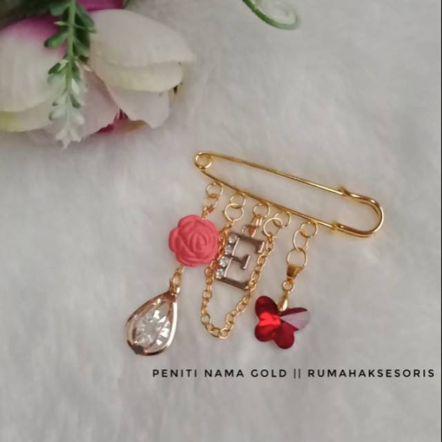 

Peniti nama gold