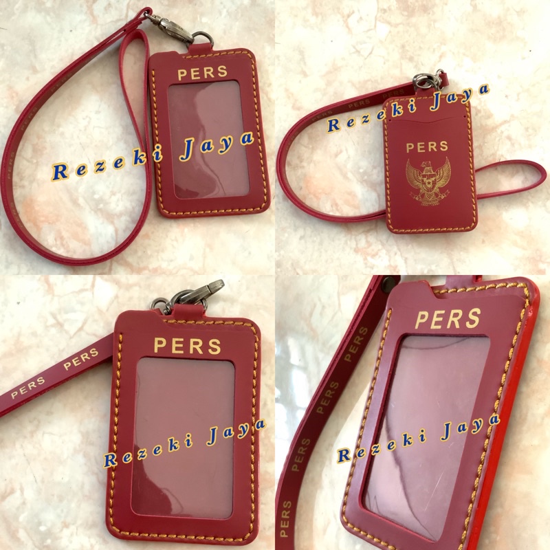 

NAME TAG ID CARD KULIT MERAH TALI LOGO PERS KUALITAS PREMIUM