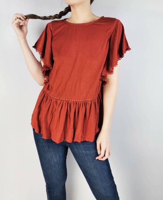 K rose spice orange ruffled top