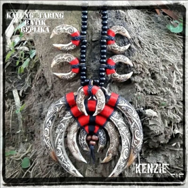 kalung taring babi etnik dayak