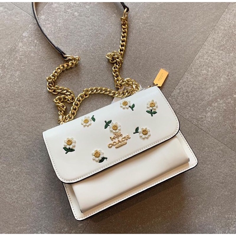 Ch klare daisy embroided slingbag