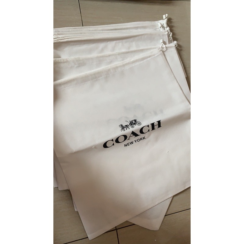 

dustbag coach logo bahan spunbond