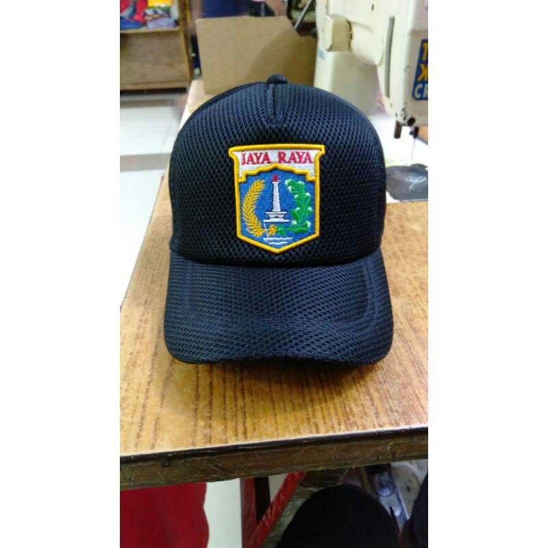 Topi Jaring DKI logo timbul