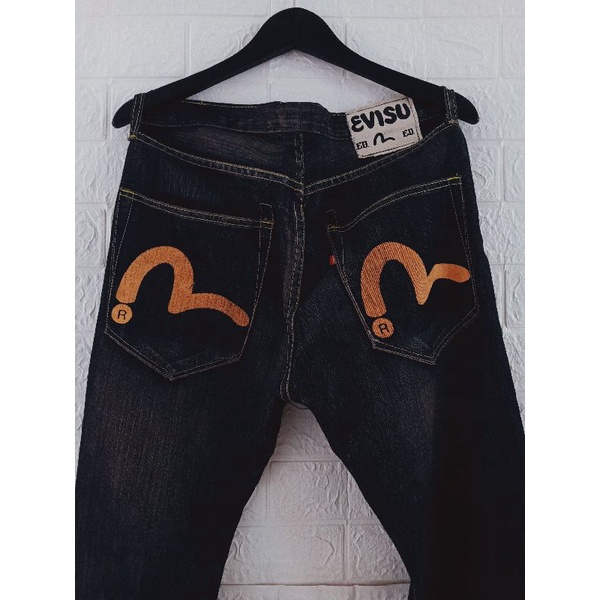 Evisu jeans denim yellow logo ® evisu yamane genes bekas