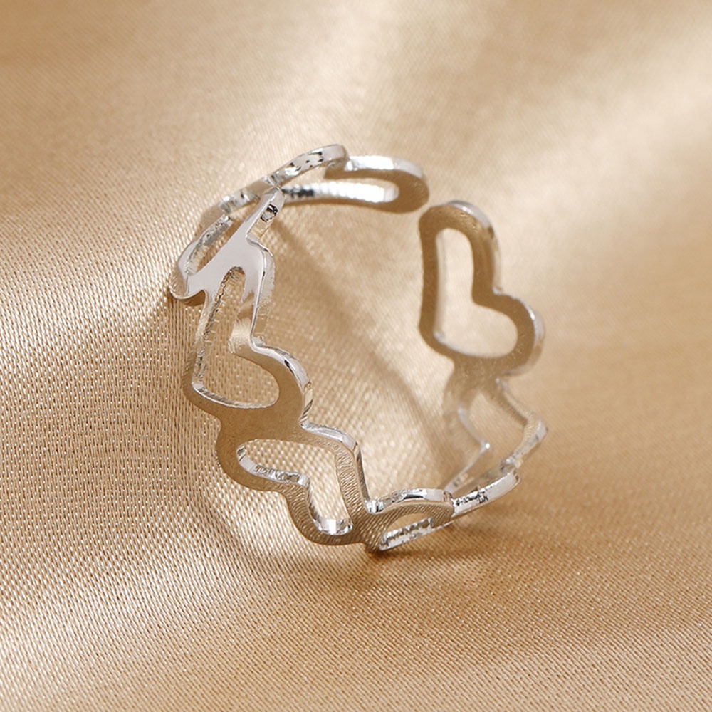 Cincin Model Terbuka Adjustable Bentuk Hati Hollow Out Bahan Metal Warna Emas / Silver Untuk Wanita