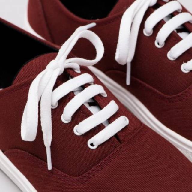 maroon colored sneakers