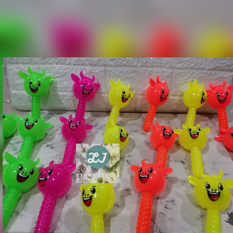 RUBBER STIK TOYS STICK TOY MAINAN ANAK Boneka Lampu dan Suara Puffer Ball cute animal best