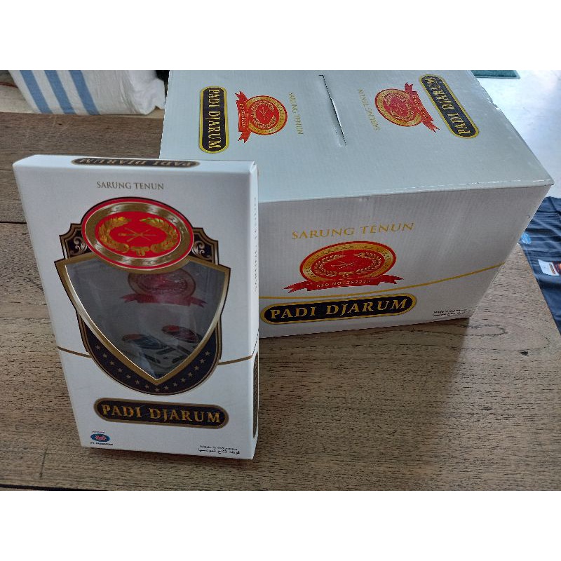 Sarung Padi Djarum Hitam Polos pakai Tumpal