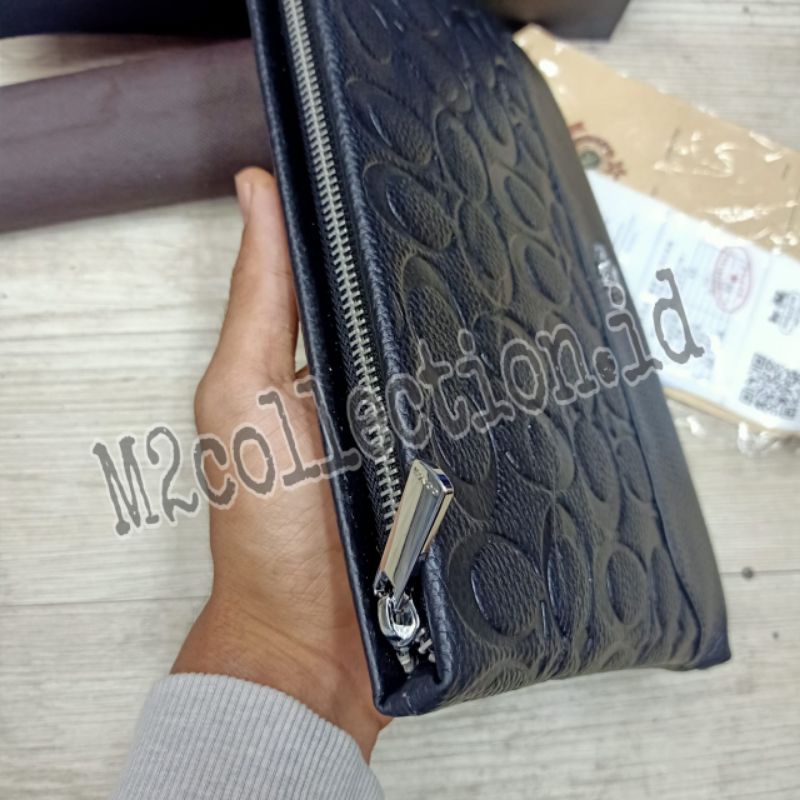 Tas Tangan Coach clutch bag/handbag Leather