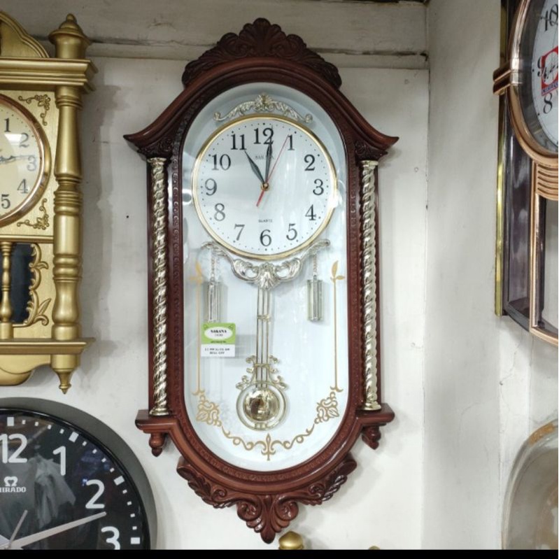 jam dinding sakana klasik bandul goyang music perjam