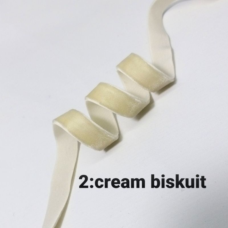 

per rol 15 meter,pita bludru/velvet elastis warna krem biskuit lebar 1 cm