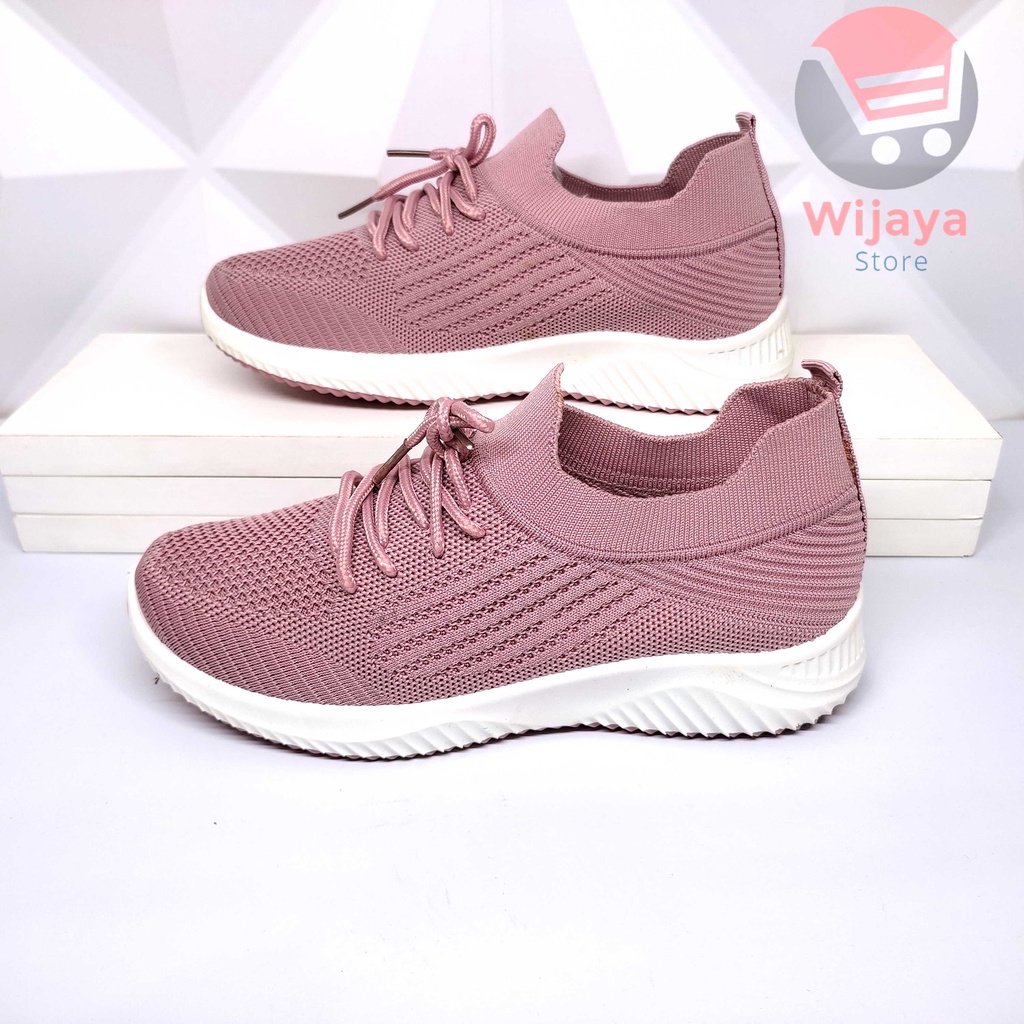 Sepatu Wanita Sneakers Rajut Import Olahraga dan Kasual dengan Sentuhan Fashionable