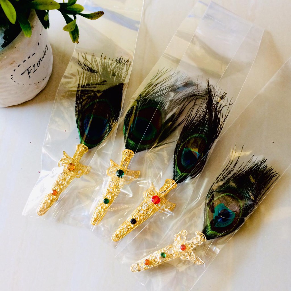 bros udeng keris bulu merak