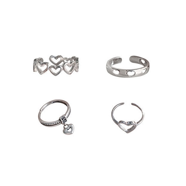 4pcs / Set Cincin Model Twist Hollow Hati Warna Silver Gaya Korea Untuk Wanita