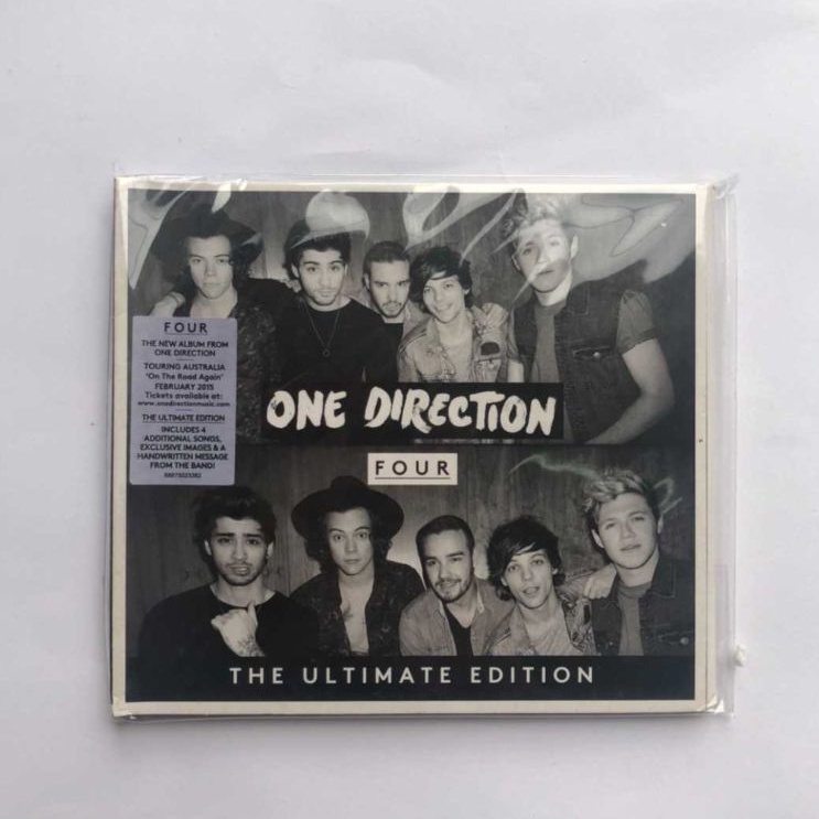 Cd one direction four deluxe edition segel import.