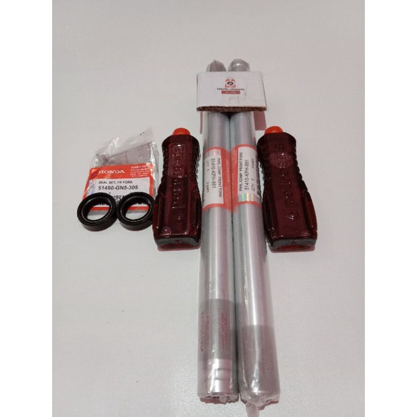 As shock depan Honda sepasang plus seal +oli Supra x 125 , karisma