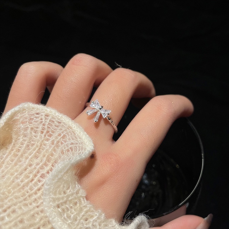 Cincin Model Terbuka Bahan 925 Silver Desain Pita Hias Kristalberlian Imitasi Adjustable Untuk Wanita