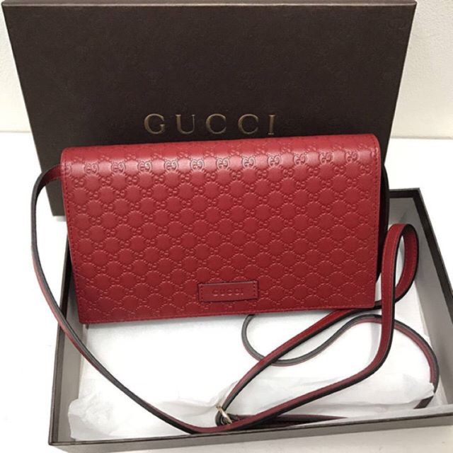 Authentic Gucci WOC with longstrap red 