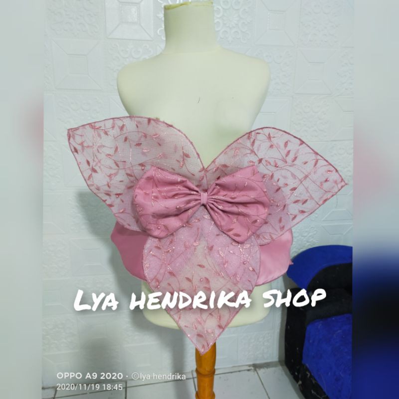 peplum kelopak bunga