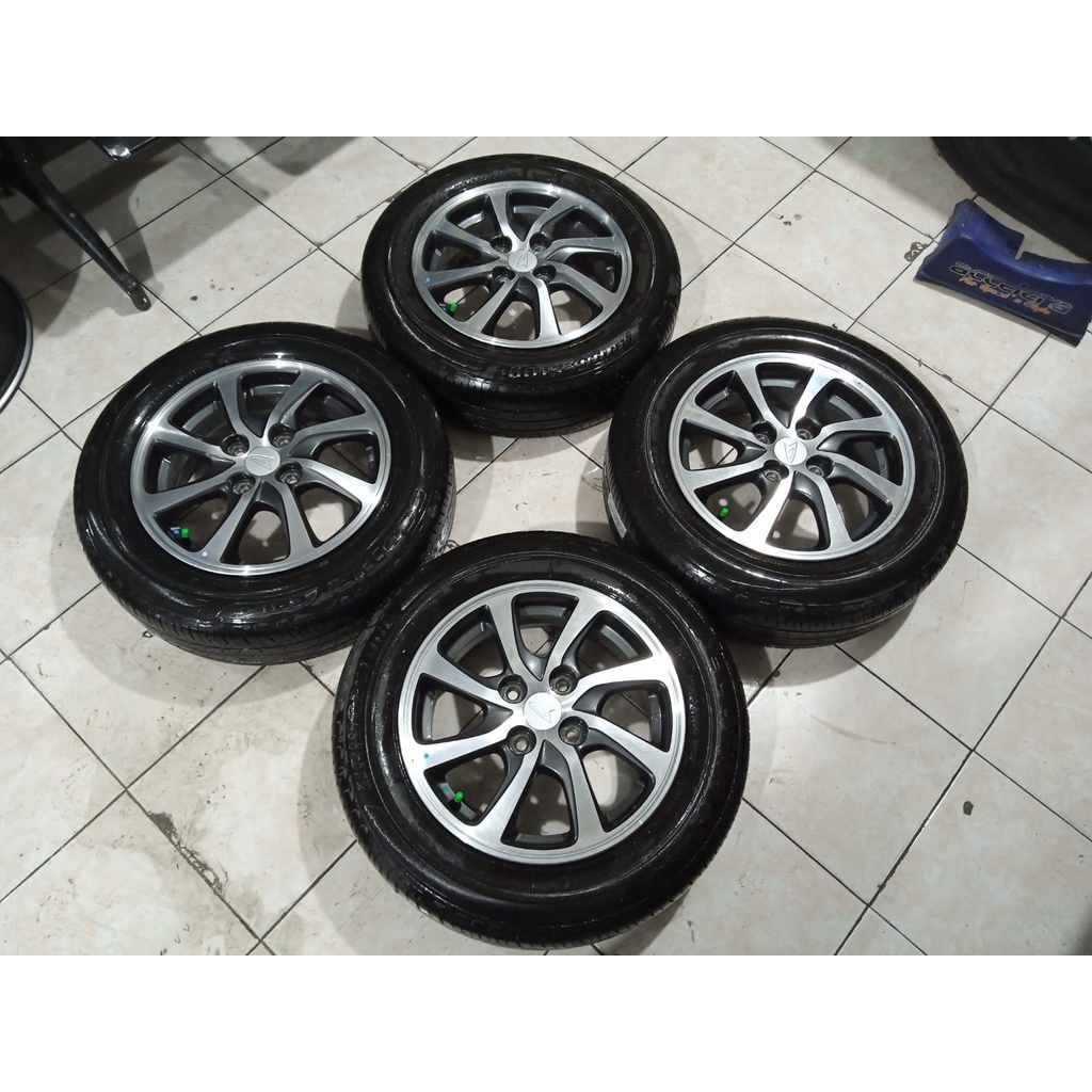 pelek pusat toko velg murah  bekas mobil sigra oem roiginal ring 14x5 pcd 4x100 ring 15 seken plus b