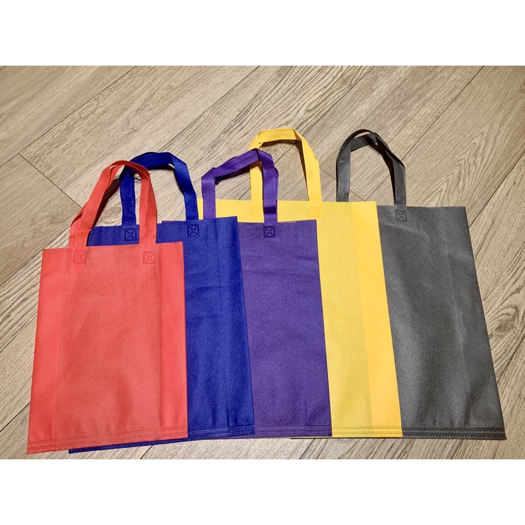 

Tas Spunbond Tali Lipat Samping Medium 30x40 cm Goodie Bag