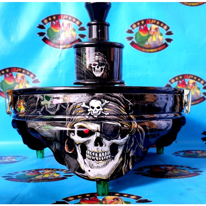 TEBOK PVC KANDANG LOVEBIRD BERMOTIF TENGKORAK DAN JOKER