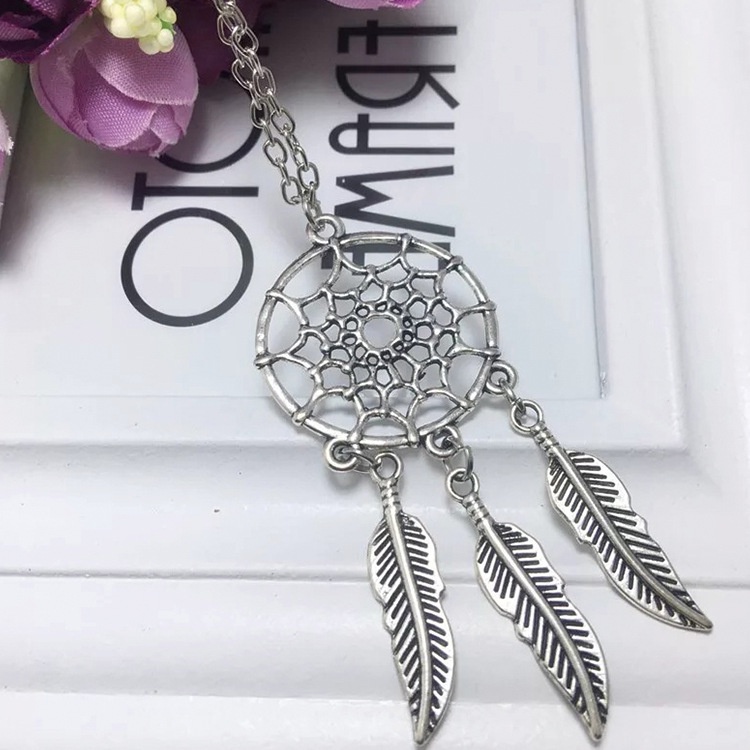 Eropa dan Amerika Bohemian gaya etnik rumbai bulu kalung dream catcher pendant hollow-out elegan kal