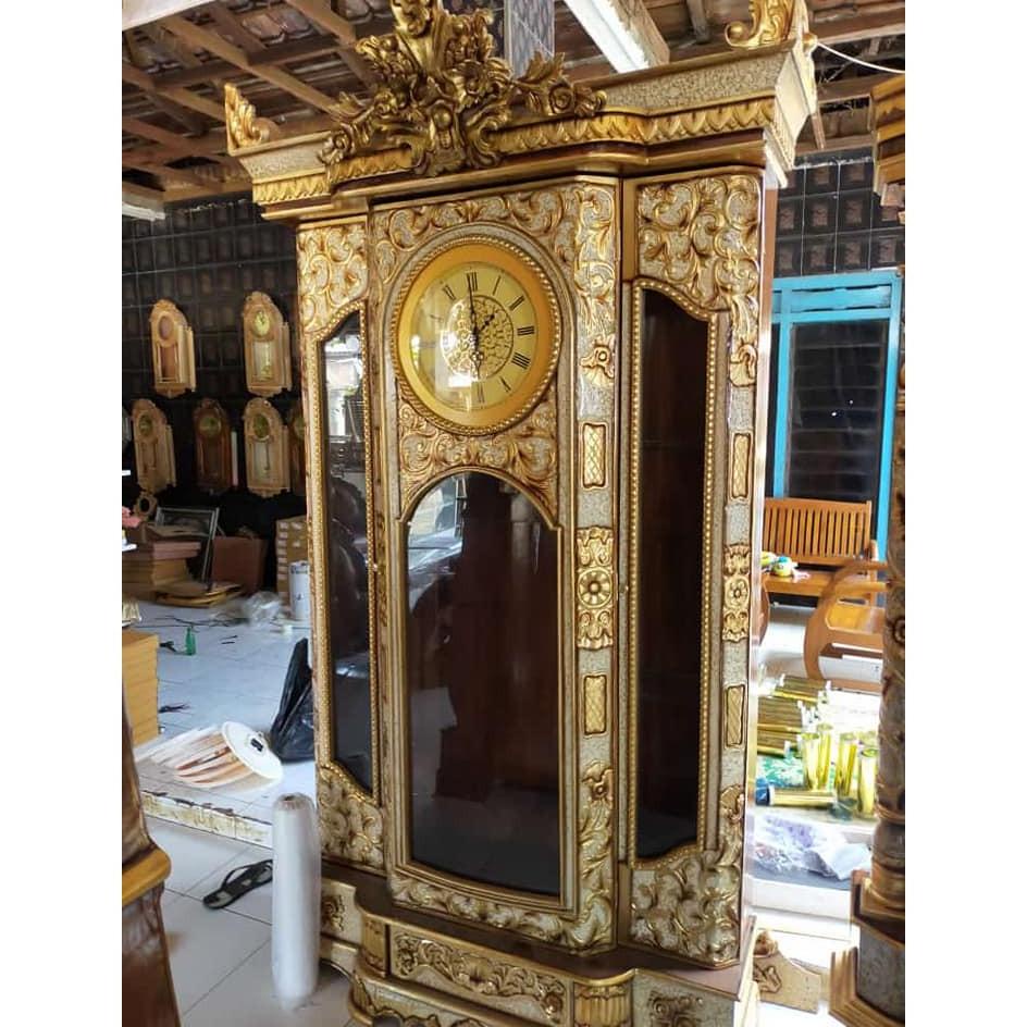 Lemari Jam Kayu Jati Ukir Ruang Tamu