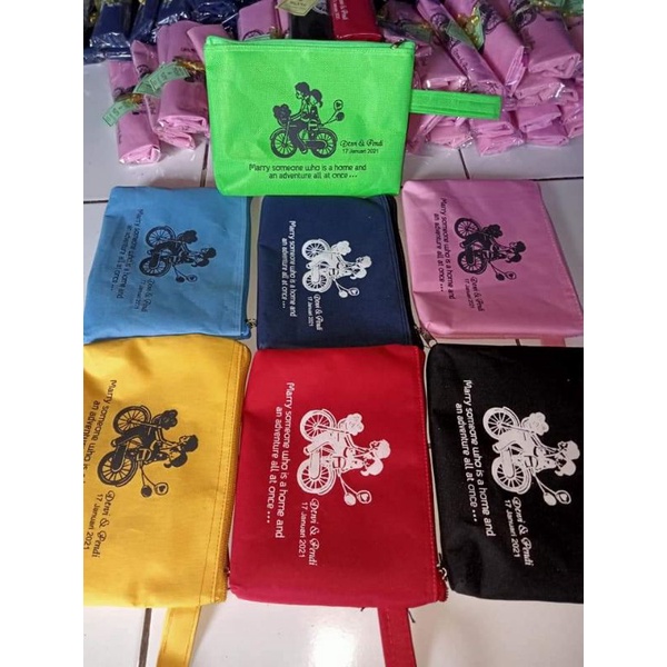 Souvenir pernikahan dompet sablon