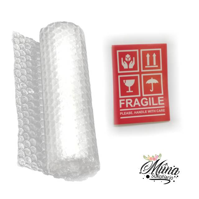 

Bubble Wrap dan Stiker Fragile untuk pengamanan paket