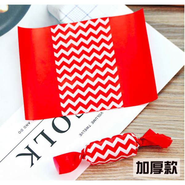 

KERTAS BUNGKUS PERMEN / COKLAT / NOUGAT ZIGZAG RED - SUGAR PAPER