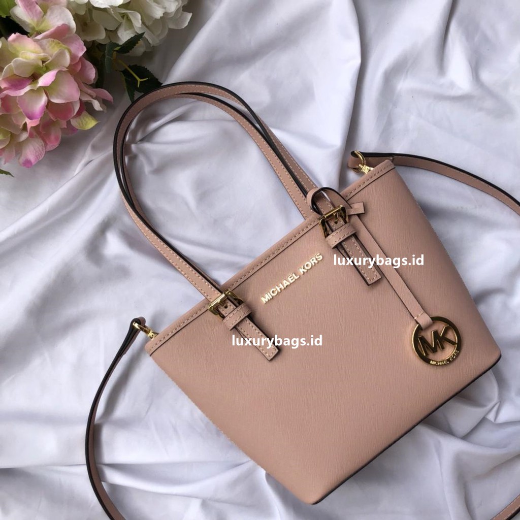 harga tas michael kors selma asli