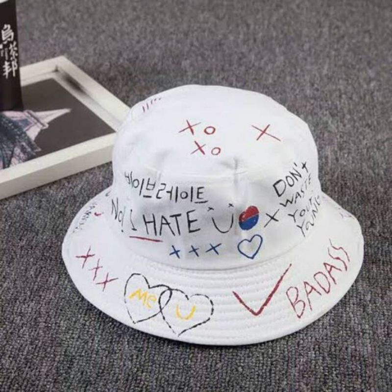 Topi bucket motif KPop timbal balik