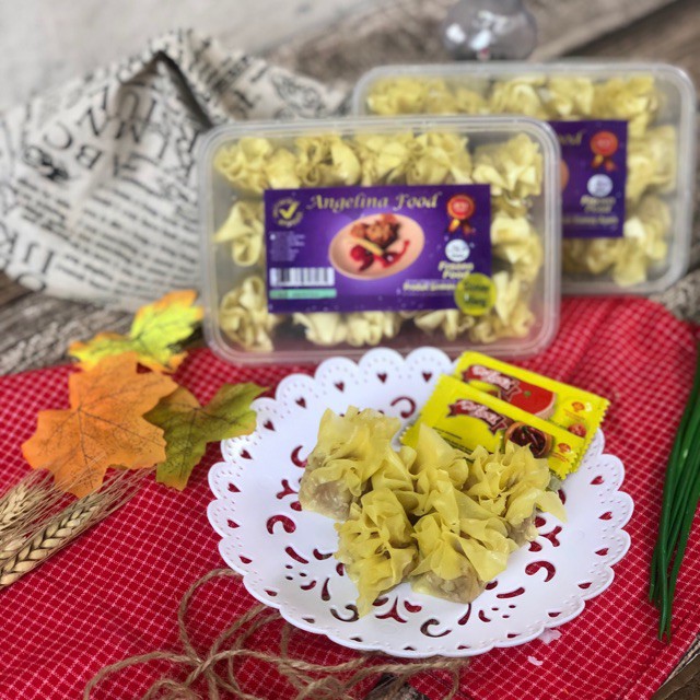 

ANGELINA SIOMAY AYAM