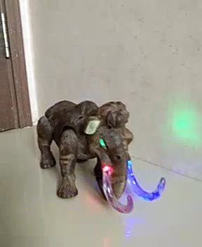  MAINAN  GAJAH  MAMMOTH BISA JALAN BERSUARA LAMPU ANAK 