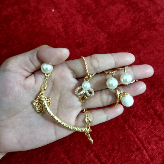 set emas xuping batu putih