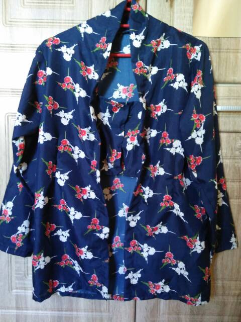 Kebaya kutu baru motif bunga