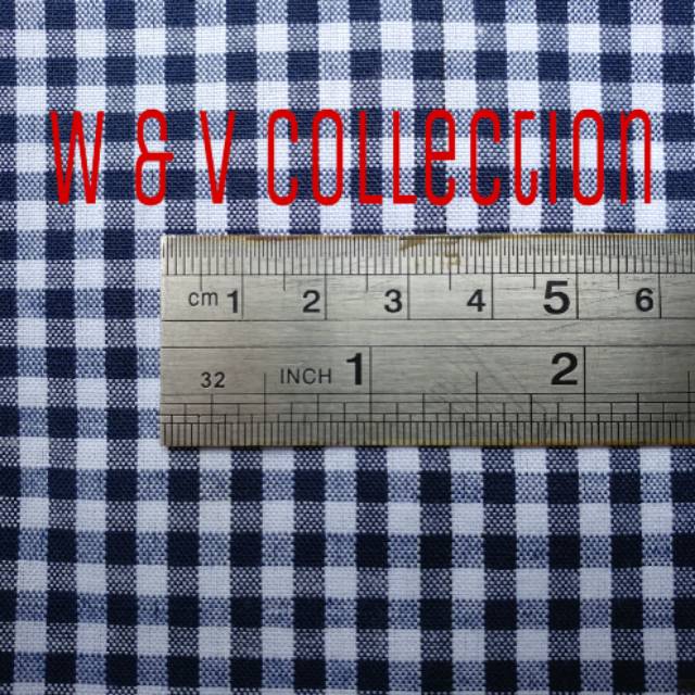 Kain kotak biru navy putih 4mm. Lebar 150cm.